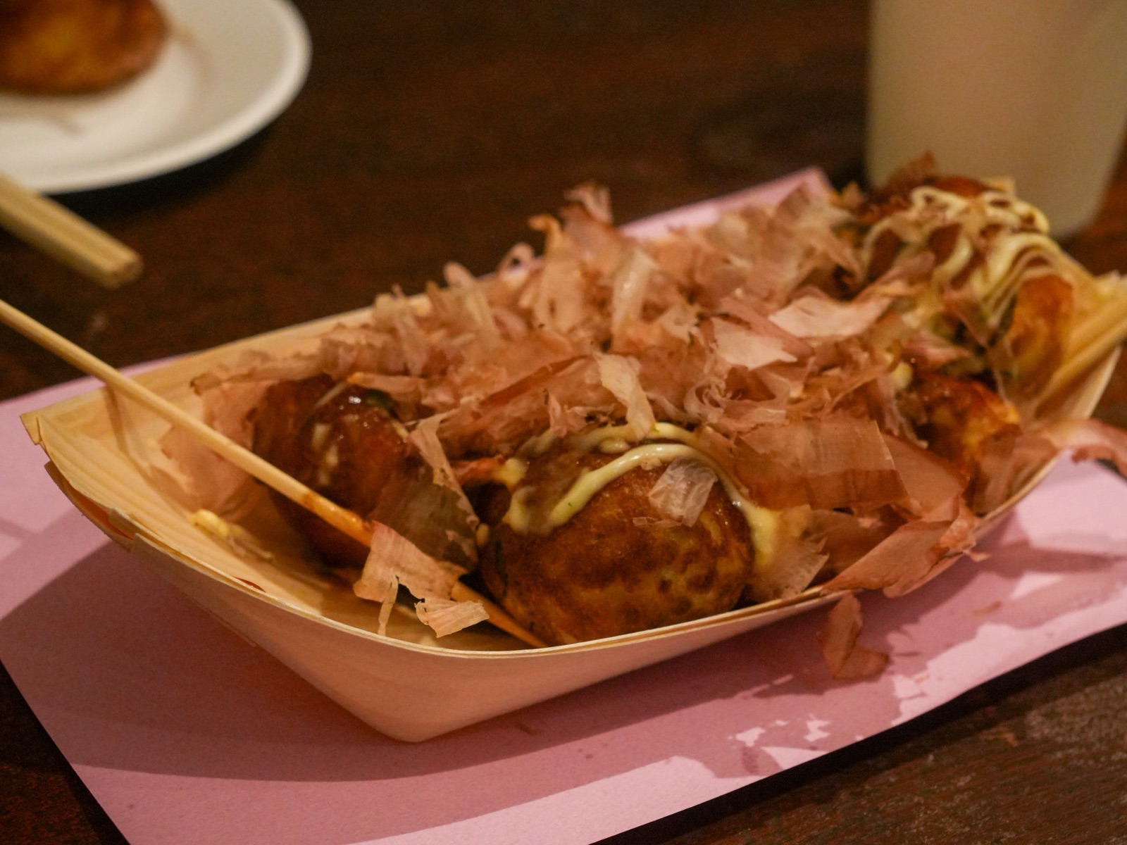 Takoyaki topped with bonito flakes